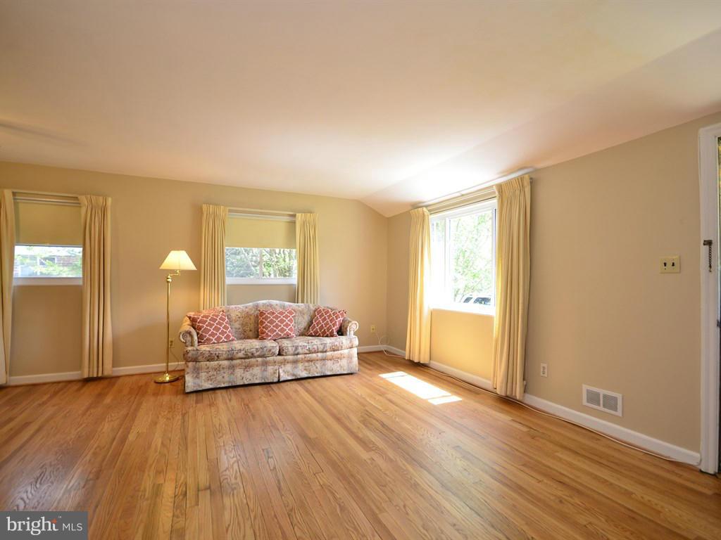 12833 Flack Street Silver Spring, MD 20906 - Photo 3 of 30 a bedroom with a bed and window