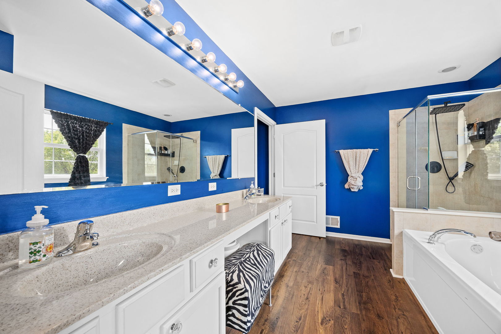 2297 Deerpath Road Bolingbrook, IL 60490 - Photo 22 of 46 a bathroom with a bathtub sink and mirror