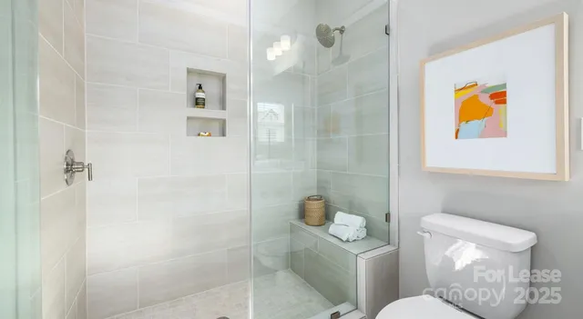 a bathroom with a toilet sink and tub