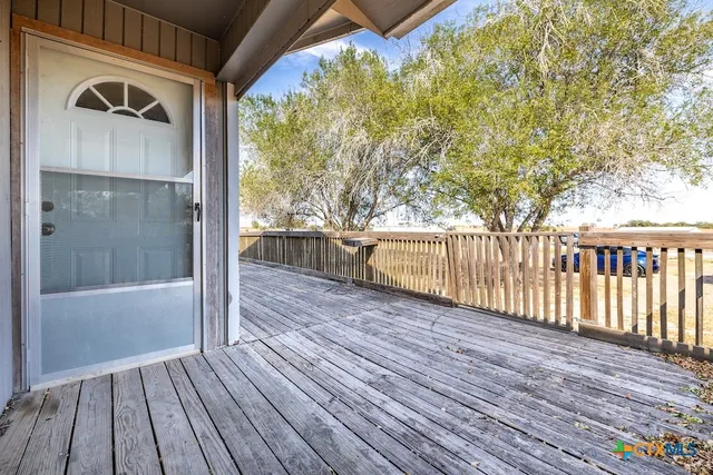 a view of a livingroom with wooden floor