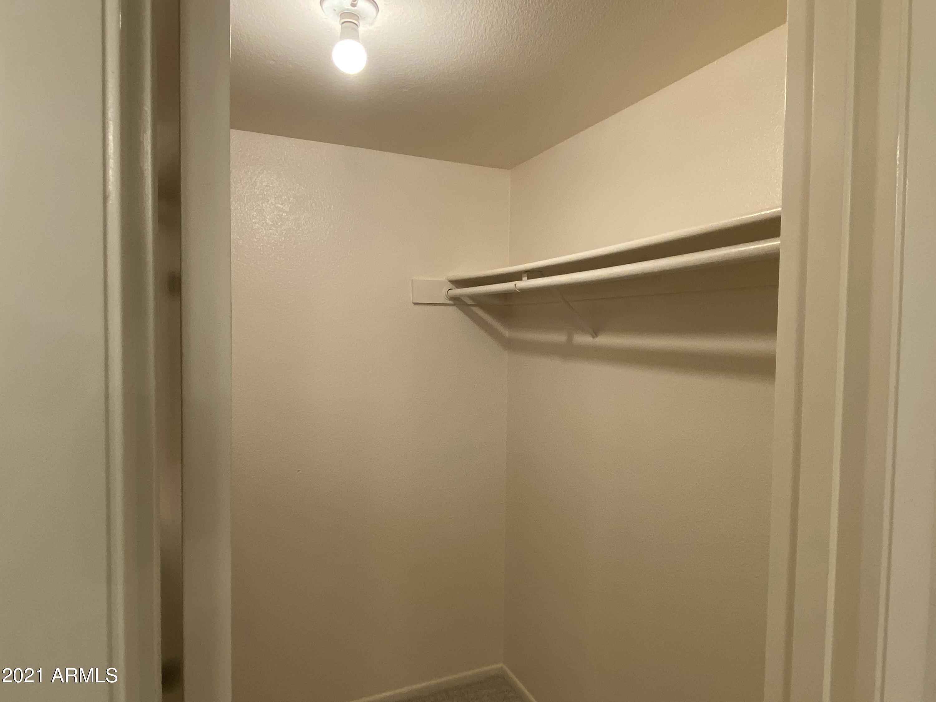 4408 West Redfield Road Glendale, AZ 85306 - Photo 14 of 26 Primary Walk In Closet