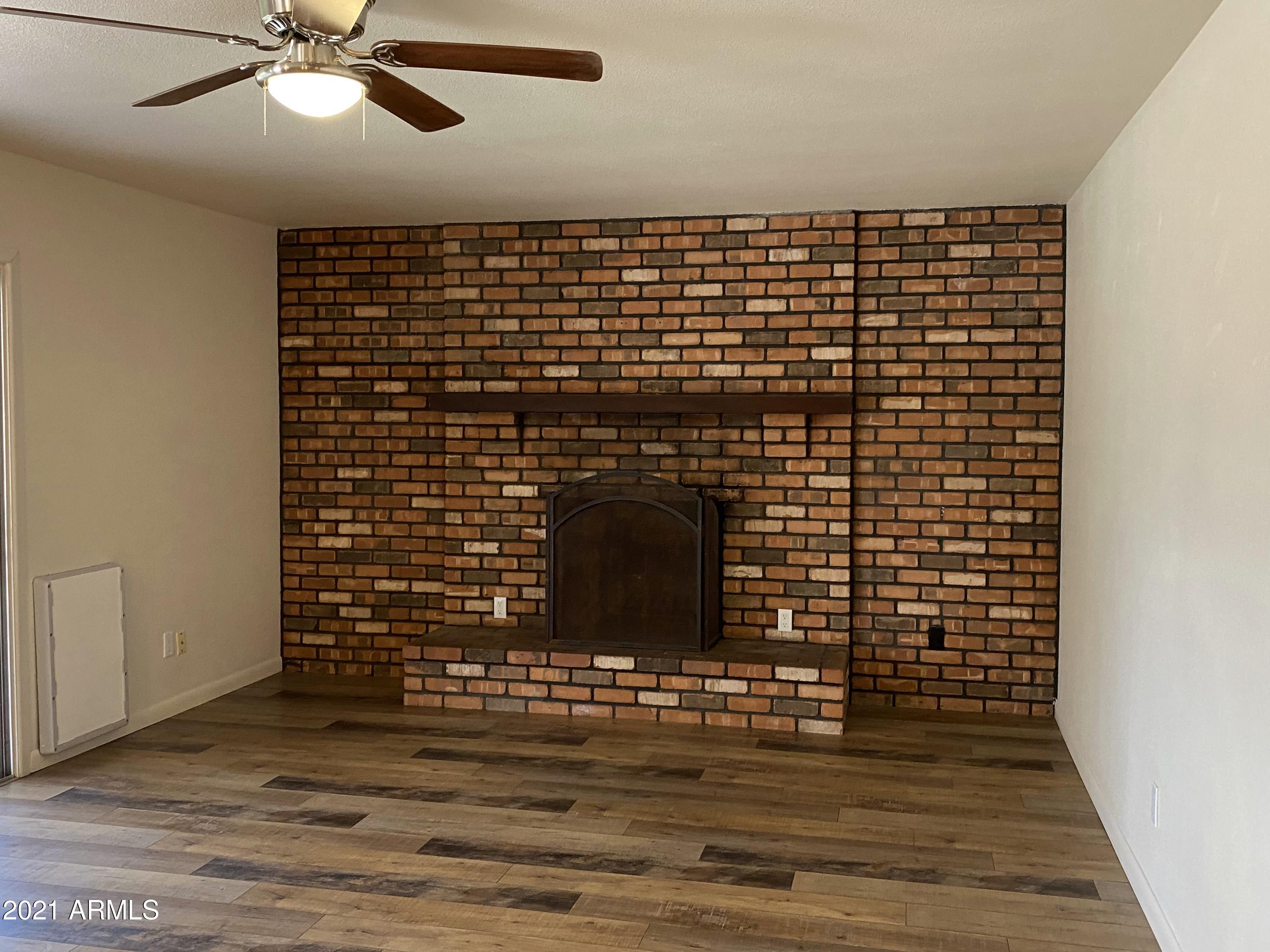 4408 West Redfield Road Glendale, AZ 85306 - Photo 7 of 26 Fireplace