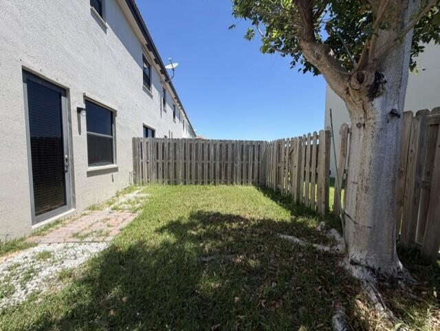 23765 Southwest 118 Avenue, Unit 23765 Homestead, FL 33032 - Photo 24 of 36 a view of outdoor space and garden