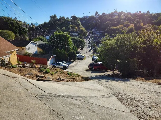 a view of a backyard of the house