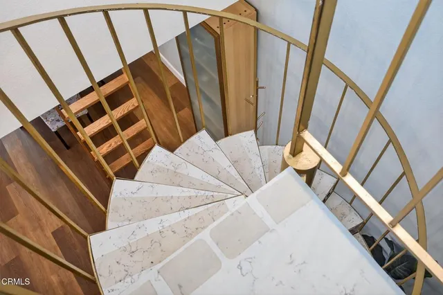 a bedroom with a bed and a table