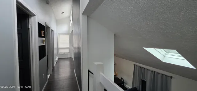 a view of hallway with stairs