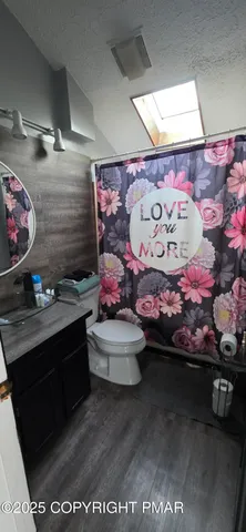 a room with lots of different colored cloths