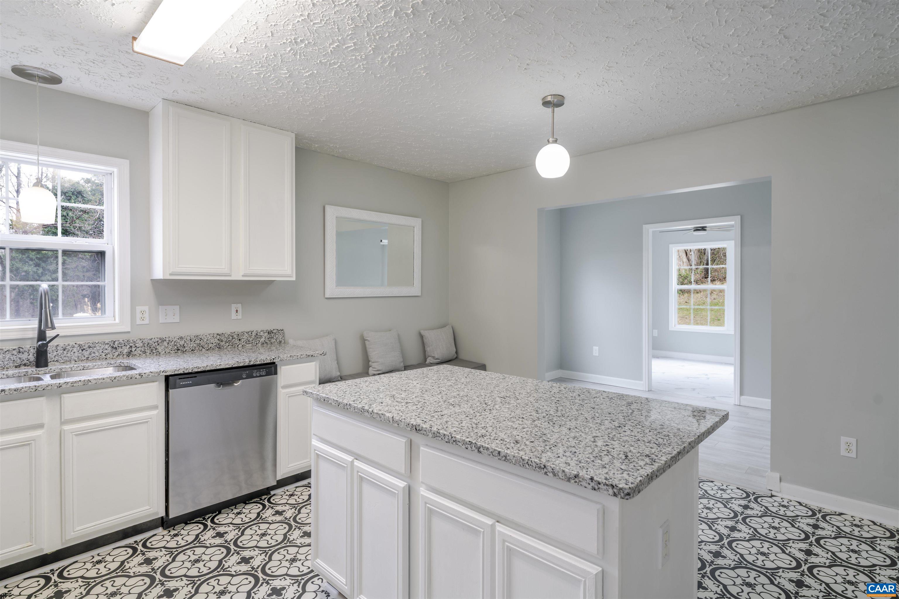5860 Bearwood Road Crozet, VA 22932 - Photo 11 of 67 a kitchen that has a sink and a stove in it