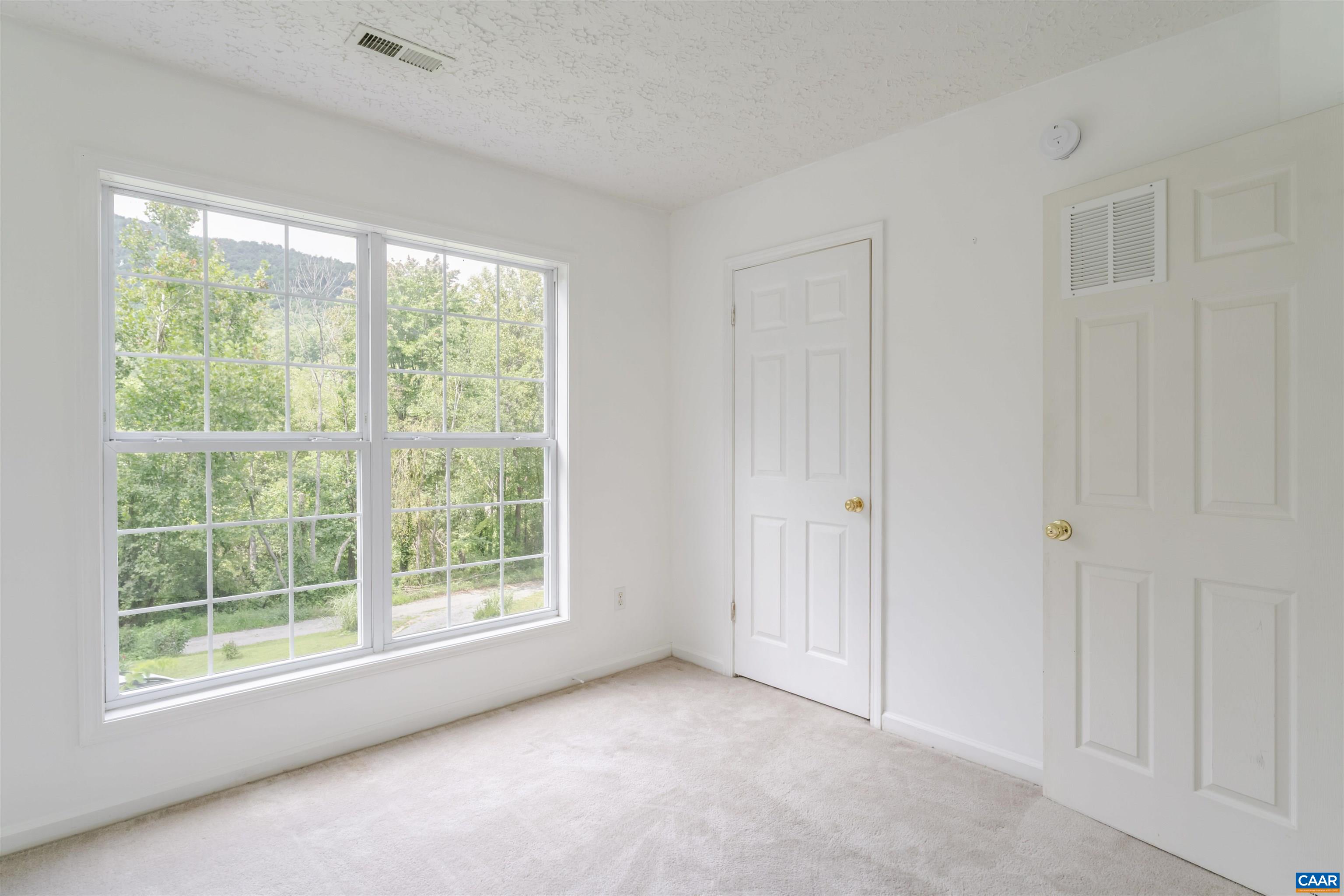5860 Bearwood Road Crozet, VA 22932 - Photo 38 of 67 a view of an empty room with a window