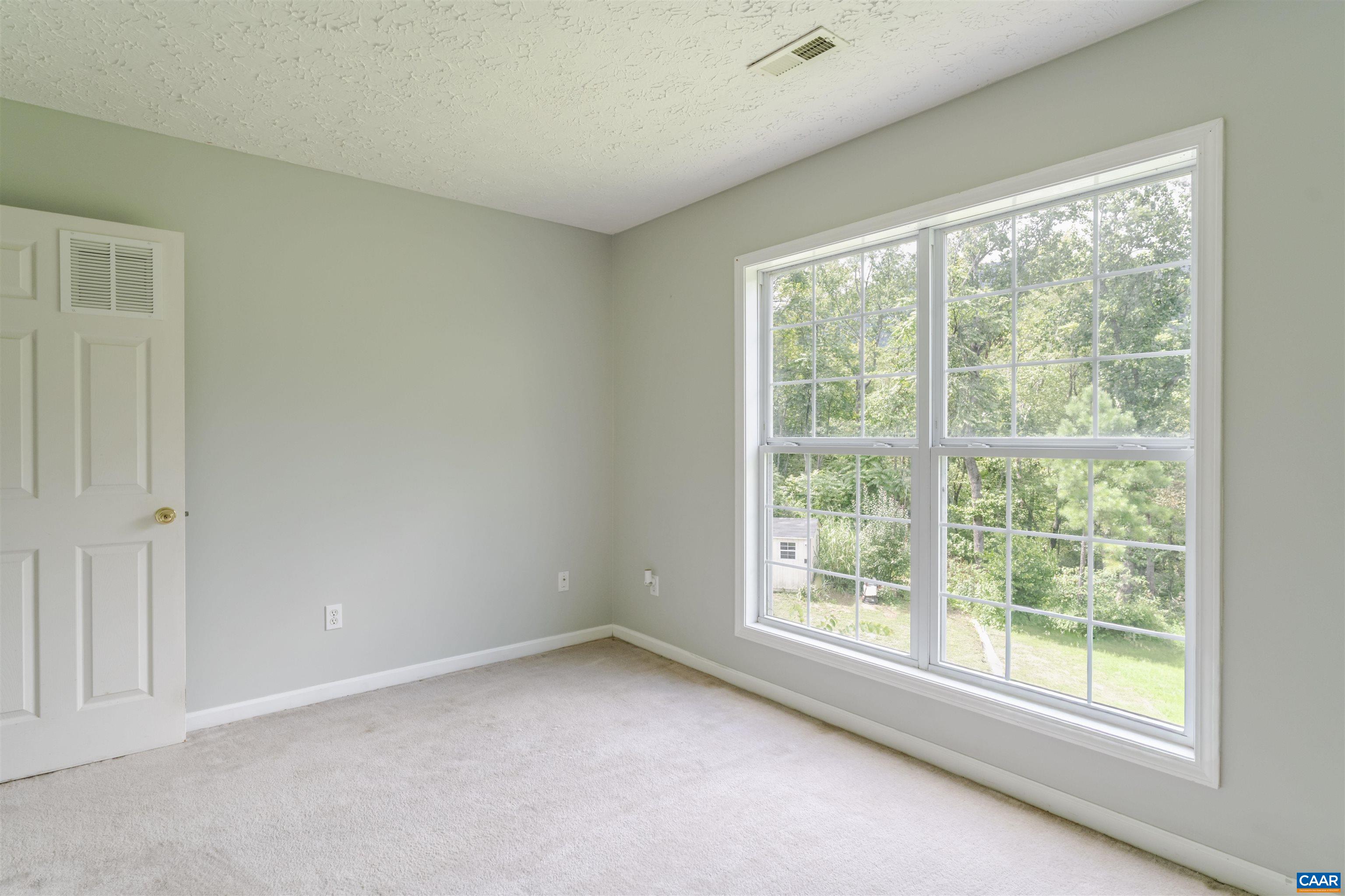 5860 Bearwood Road Crozet, VA 22932 - Photo 41 of 67 a view of an empty room with a window
