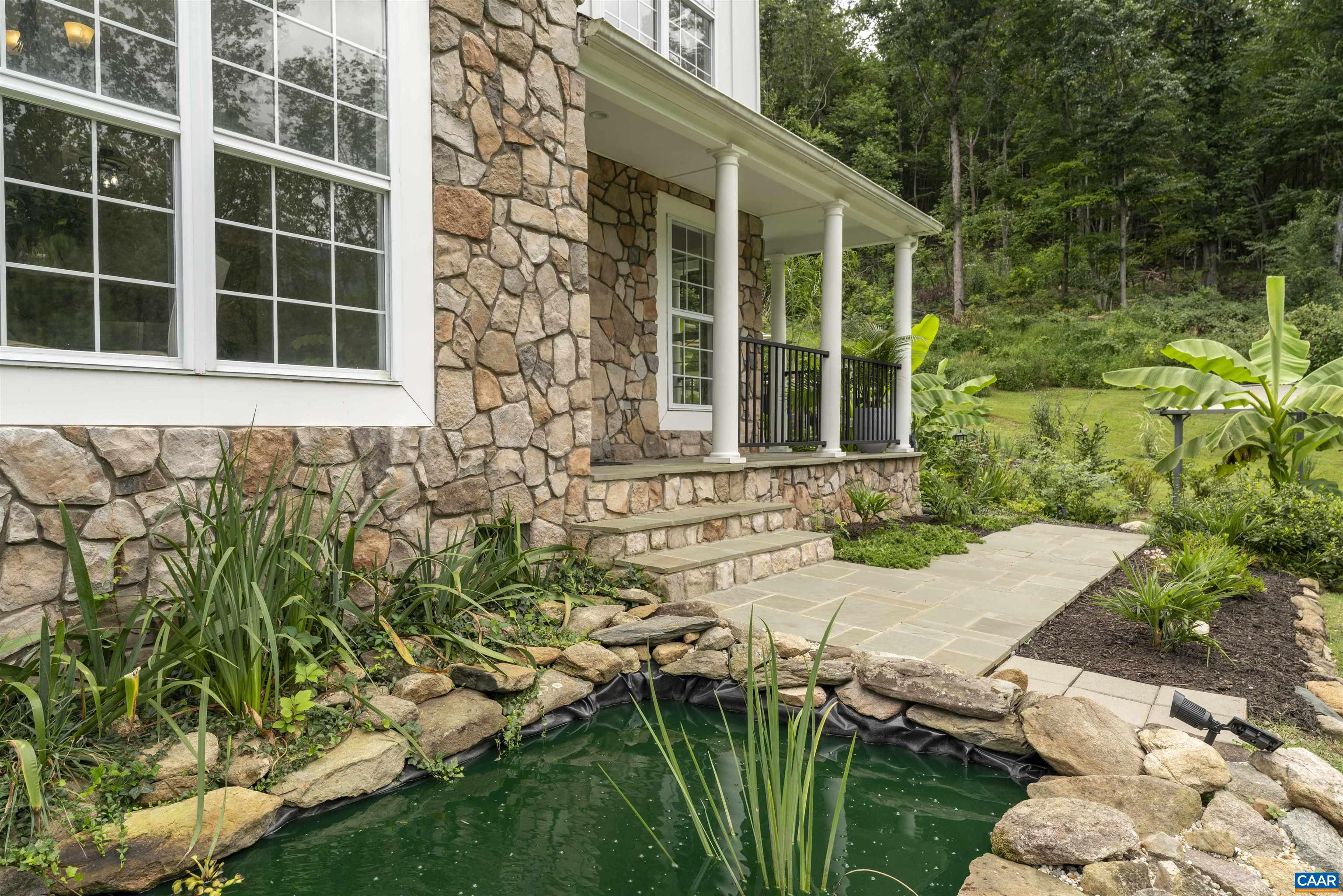 5860 Bearwood Road Crozet, VA 22932 - Photo 5 of 67 a front view of a house with a yard