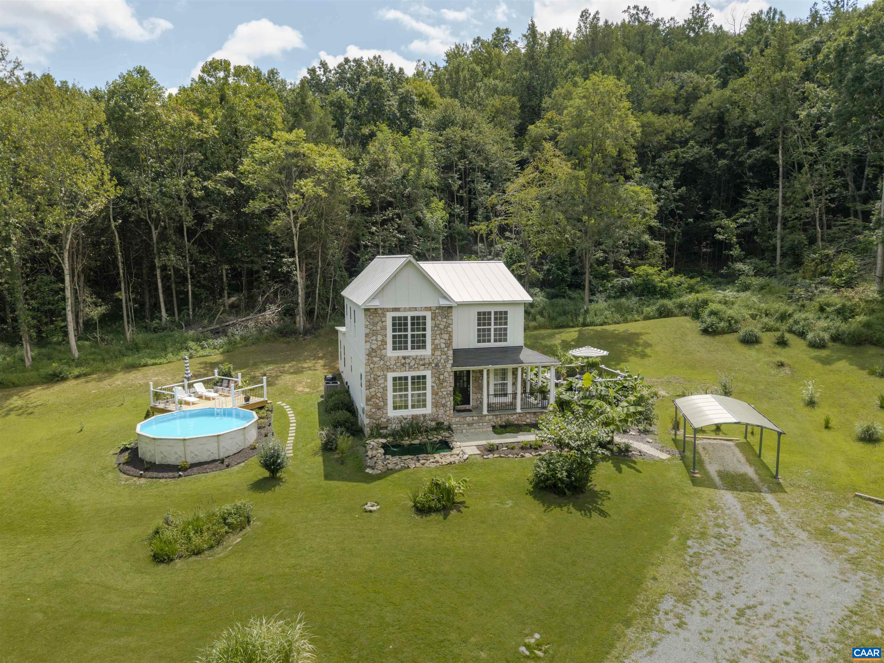 5860 Bearwood Road Crozet, VA 22932 - Photo 51 of 67 a house with swimming pool in front of it