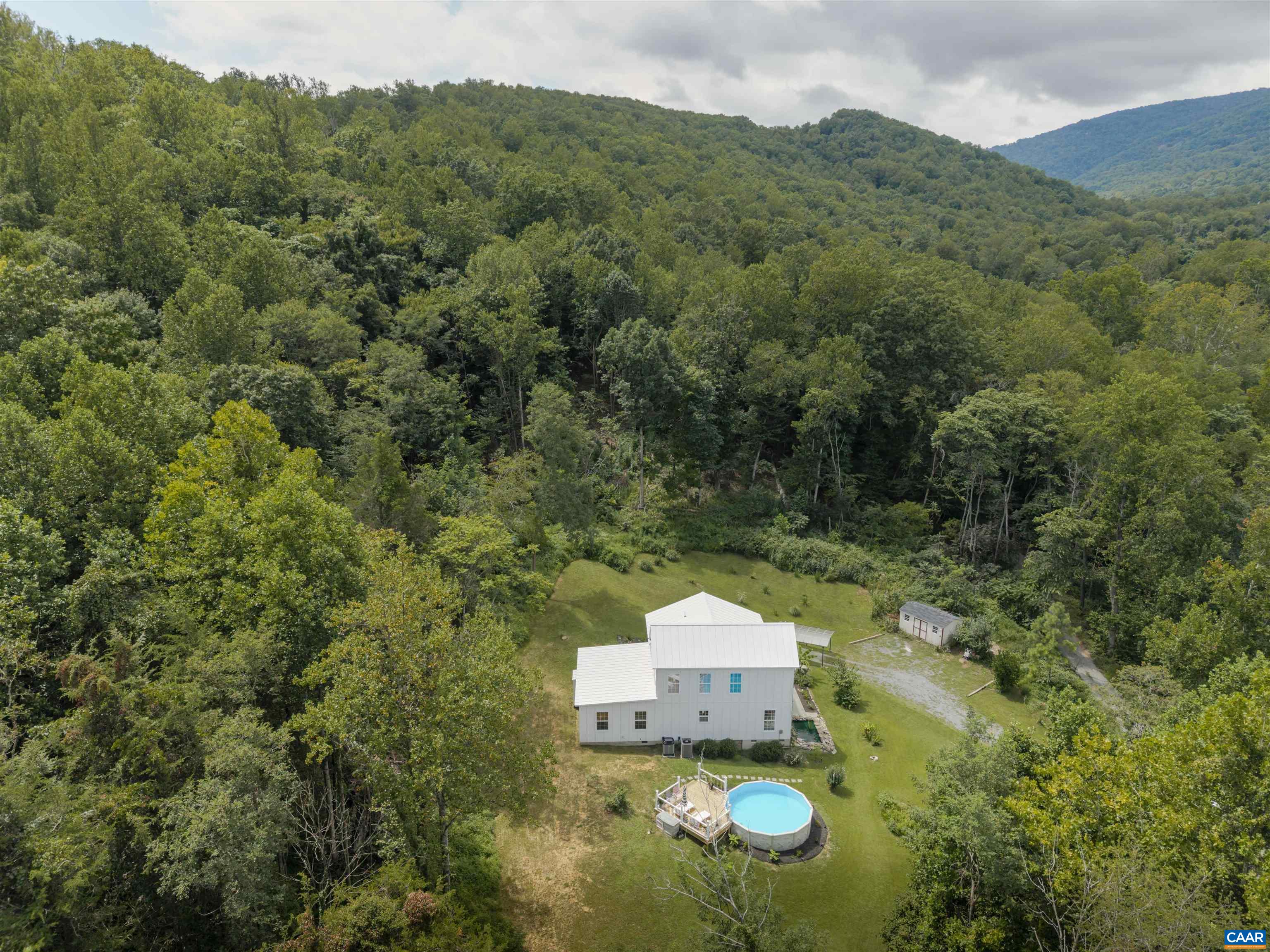 5860 Bearwood Road Crozet, VA 22932 - Photo 56 of 67 an aerial view of a house with a yard