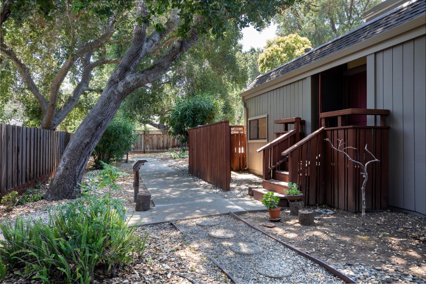 2 Farm Road Los Altos, CA 94024 - Photo 23 of 23 a view of a chair and table in the backyard