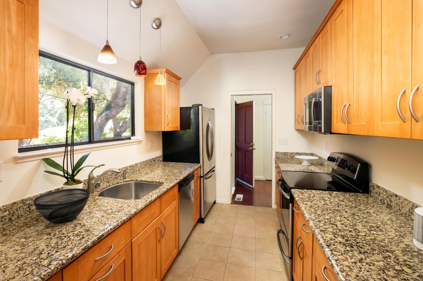 2 Farm Road Los Altos, CA 94024 - Photo 7 of 23 a kitchen with stainless steel appliances granite countertop a sink stove and refrigerator