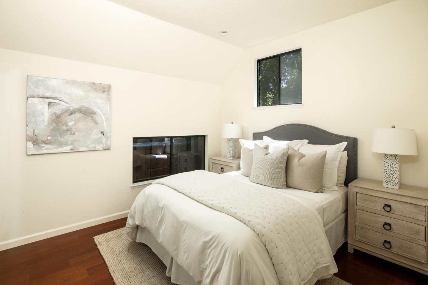 2 Farm Road Los Altos, CA 94024 - Photo 9 of 23 a bedroom with a bed and painting on the wall