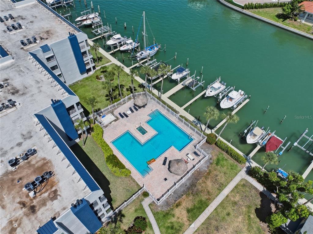 363 Pinellas Bayway South, Unit 29 Tierra Verde, FL 33715 - Photo 49 of 59 an aerial view of a house a table and chairs