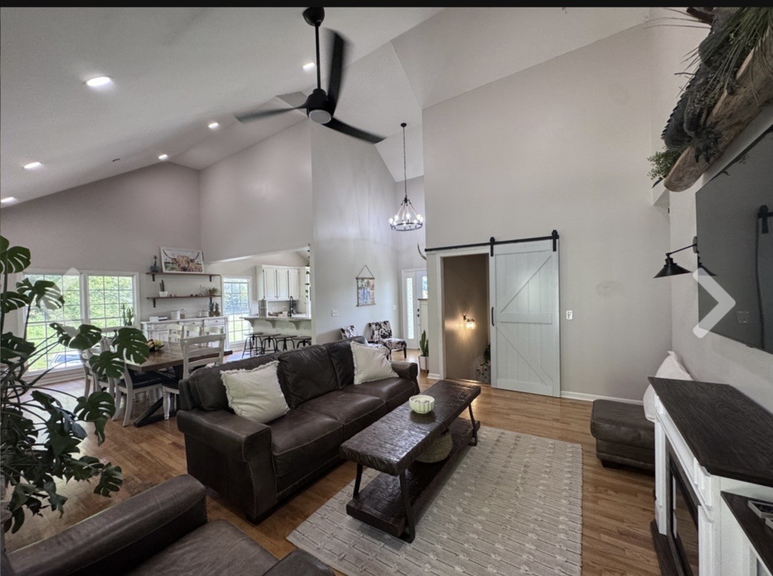 3310 Dog Branch Road Prospect, TN 38477 - Photo 16 of 49 a living room with furniture and a flat screen tv