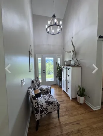 a workspace with furniture and wooden floor