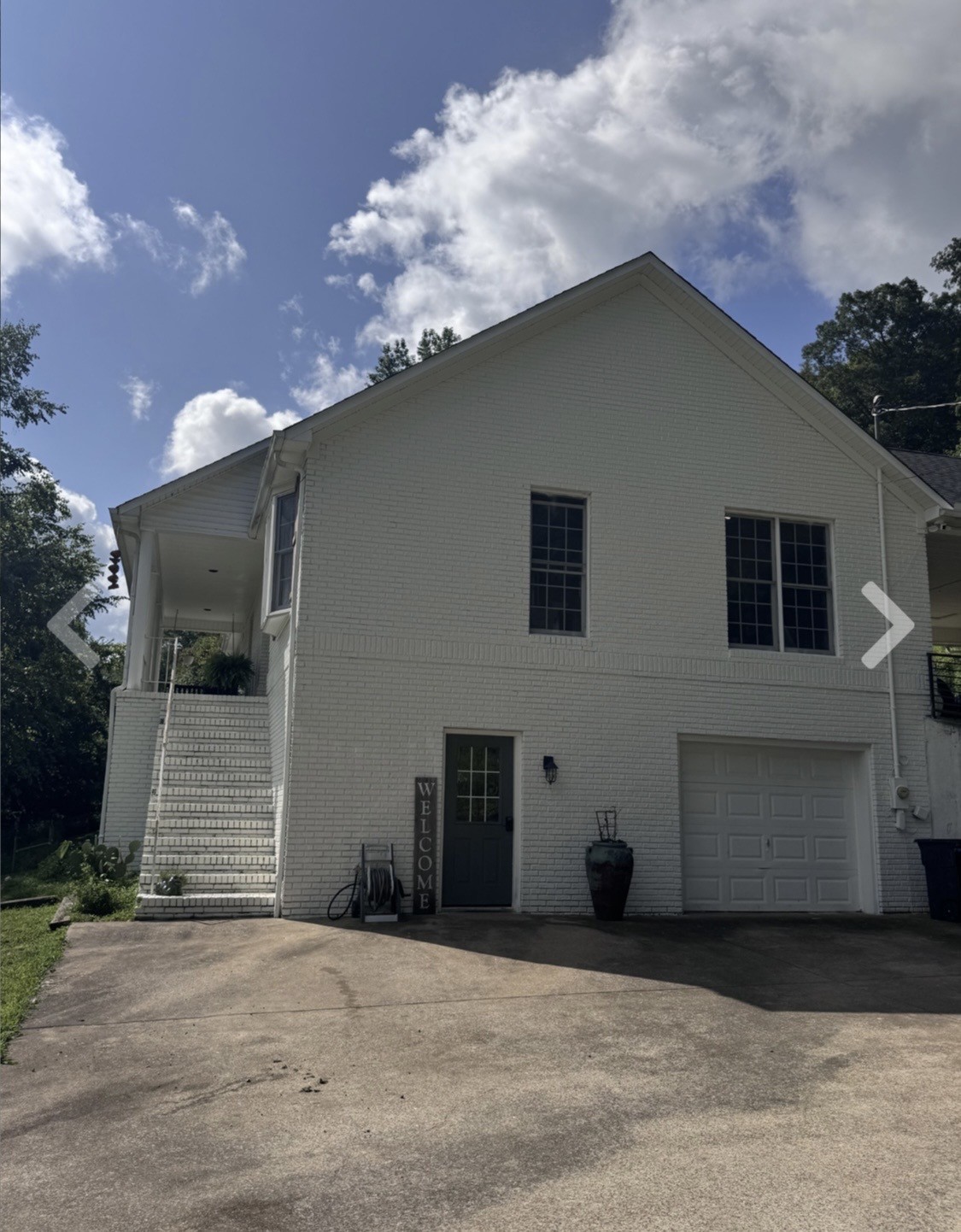 3310 Dog Branch Road Prospect, TN 38477 - Photo 3 of 49 a house that has a tree in front of it