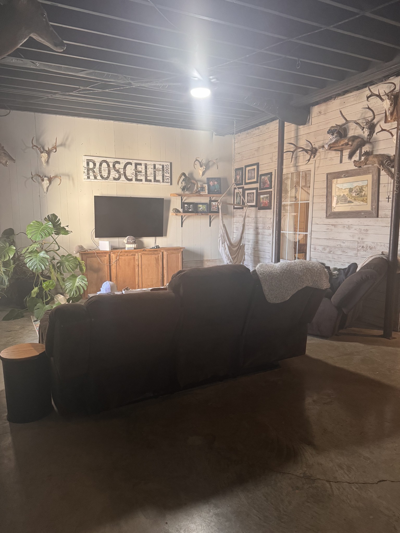 3310 Dog Branch Road Prospect, TN 38477 - Photo 48 of 49 a living room with furniture and a flat screen tv