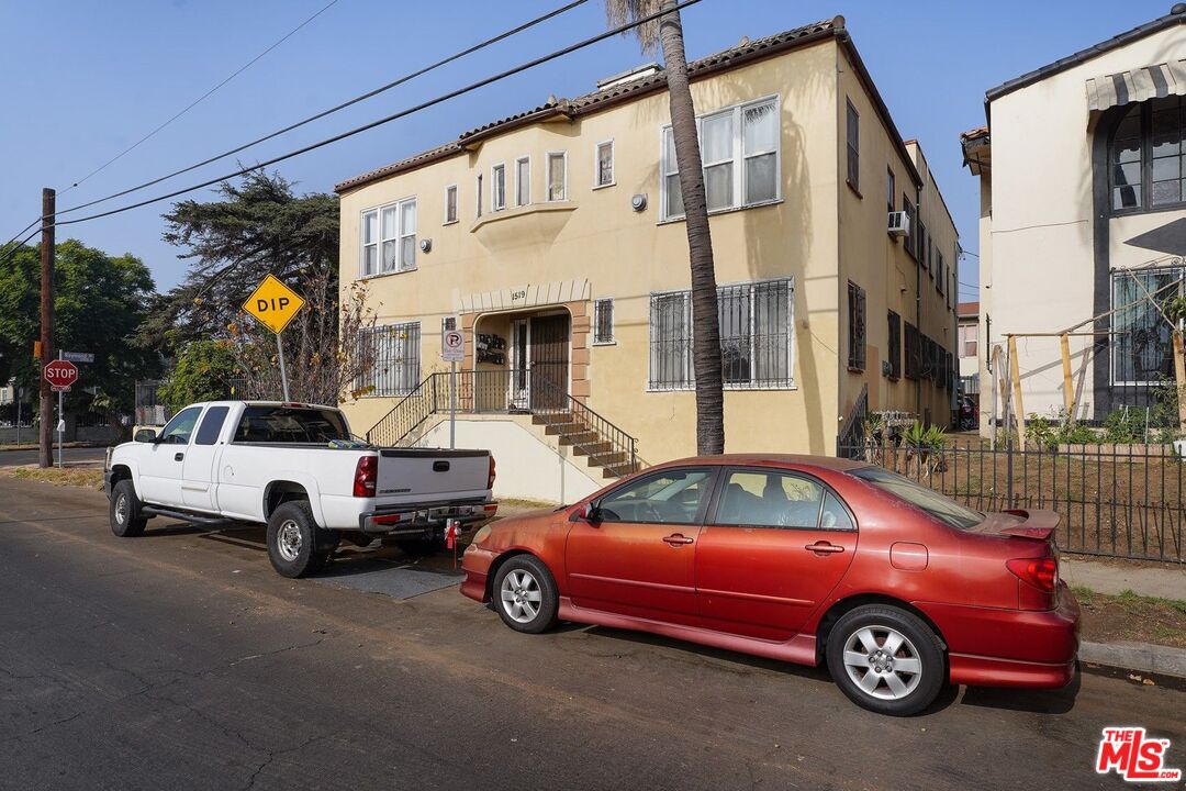1519 West 30th Street Los Angeles, CA 90007 - Photo 6 of 8 a car parked in front of a house