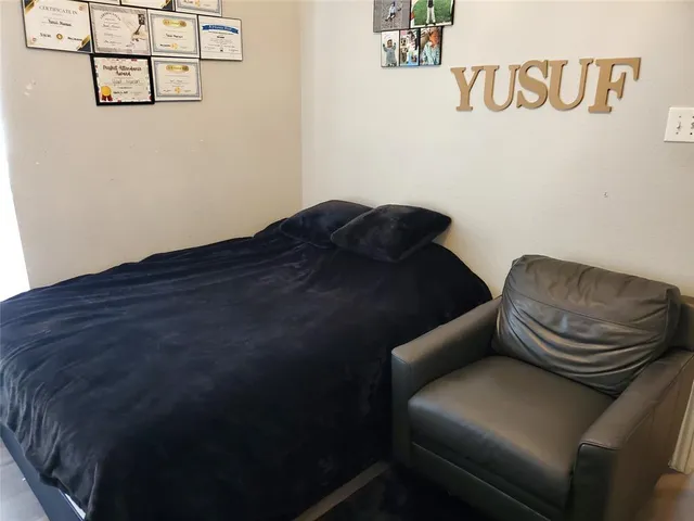 a bathroom with a toilet and a sink