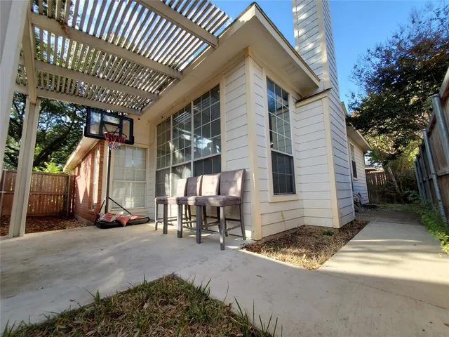 a view of balcony with furniture