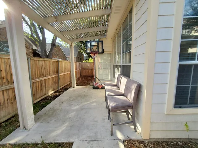 a view of a backyard with pathway