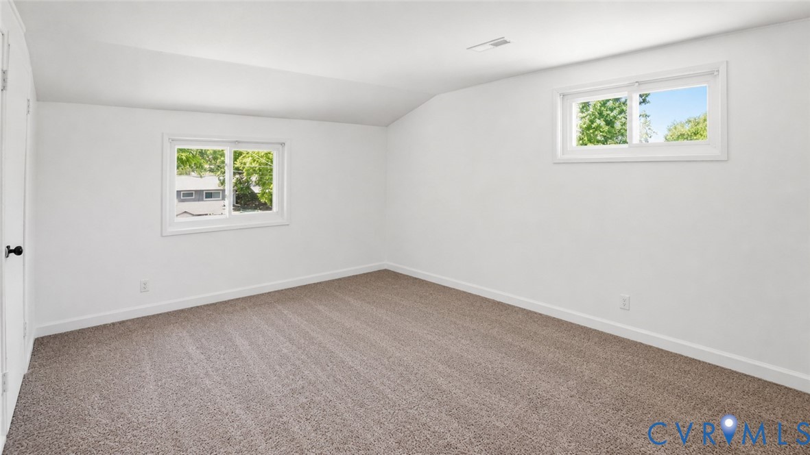 1310 Andover Road Henrico, VA 23229 - Photo 26 of 43 Spacious room featuring neutral carpeting, white w