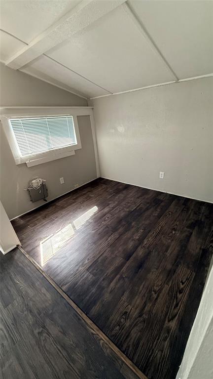 1309 Anna Street Denton, TX 76201 - Photo 4 of 13 Spare room with wood finished floors and a textured ceiling