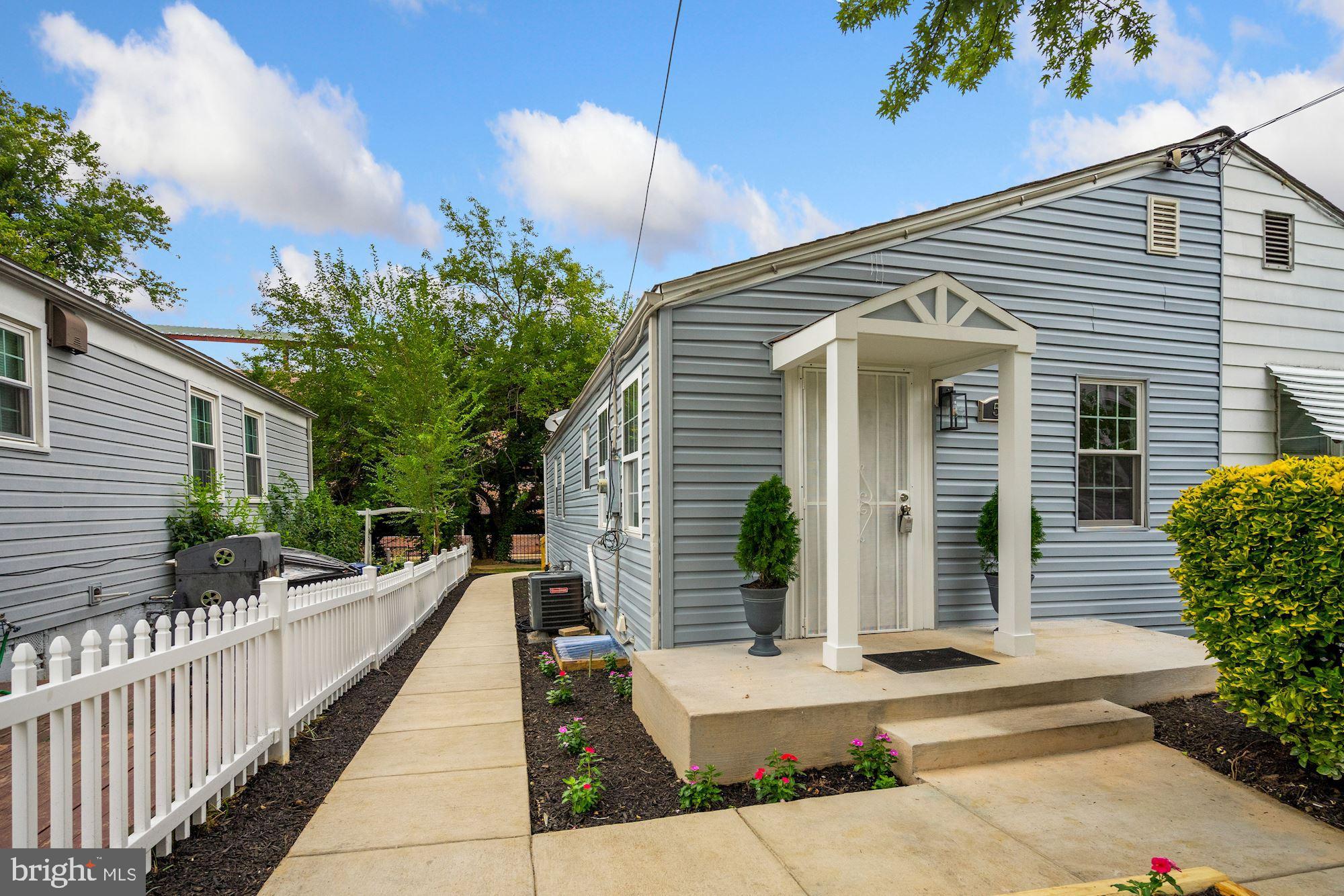 54 East Reed Avenue Alexandria, VA 22305 - Photo 1 of 26 Welcome Home! White Picket fence, front porch.