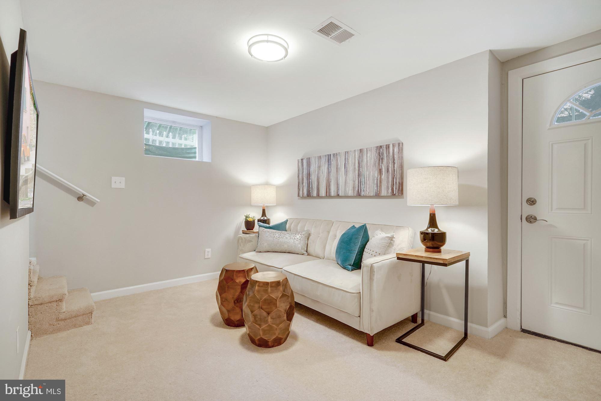54 East Reed Avenue Alexandria, VA 22305 - Photo 18 of 26 Lower level family room