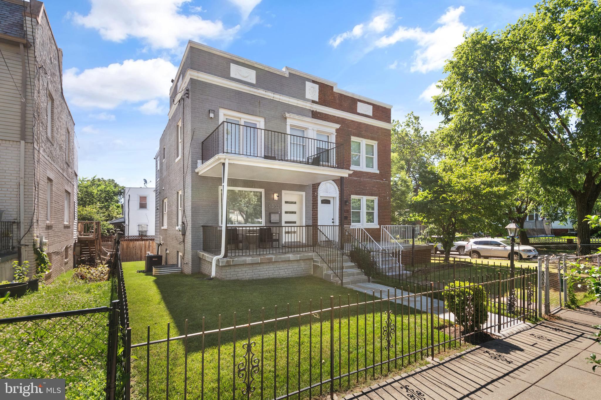 6303 9th Street Northwest Washington, DC 20011 - Photo 1 of 45 a view of a house with backyard sitting area and garden