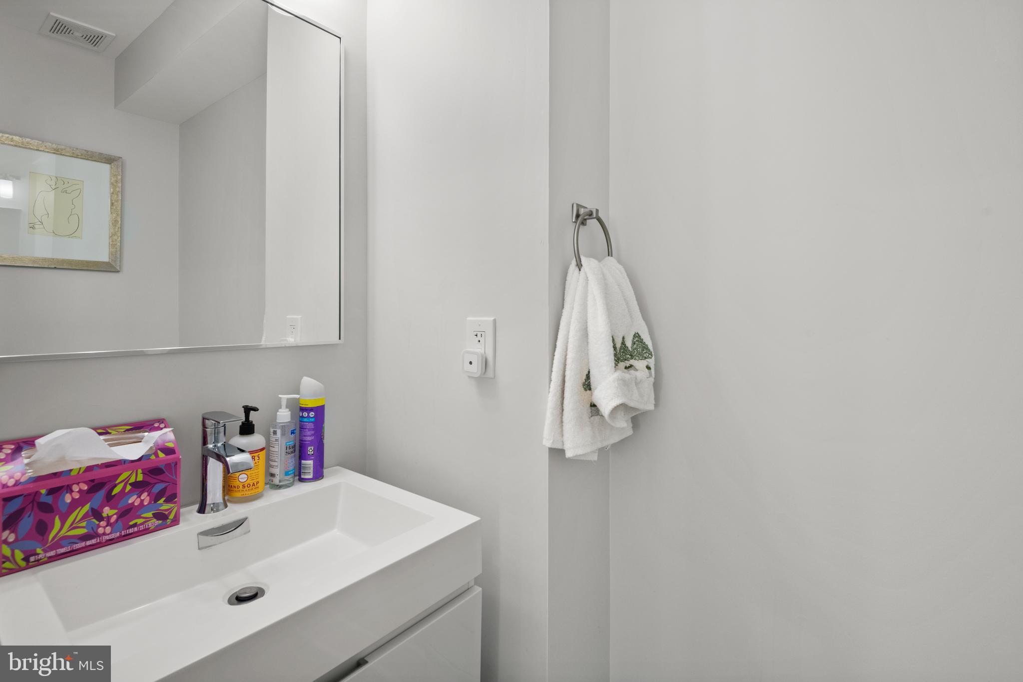 6303 9th Street Northwest Washington, DC 20011 - Photo 16 of 45 a bathroom with a sink vanity and tub