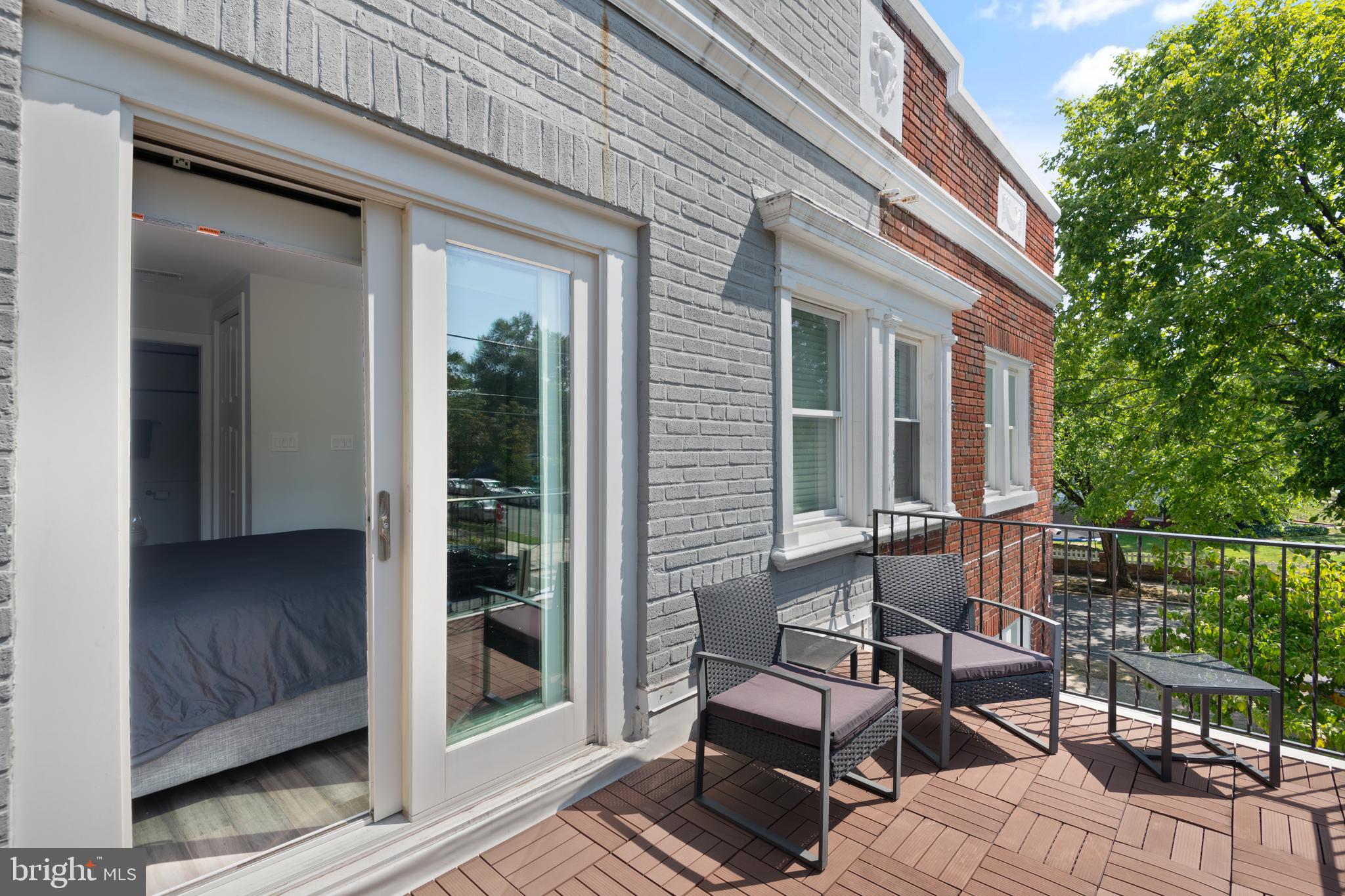 6303 9th Street Northwest Washington, DC 20011 - Photo 18 of 45 a view of backyard with outdoor seating and plants