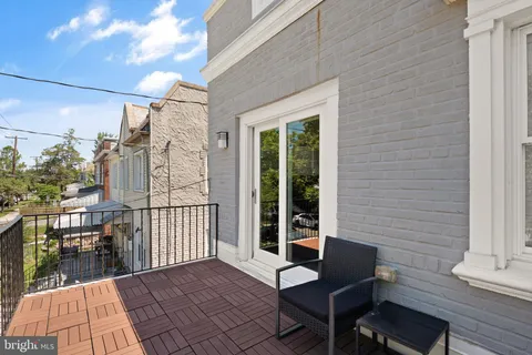 a view of a balcony with chair
