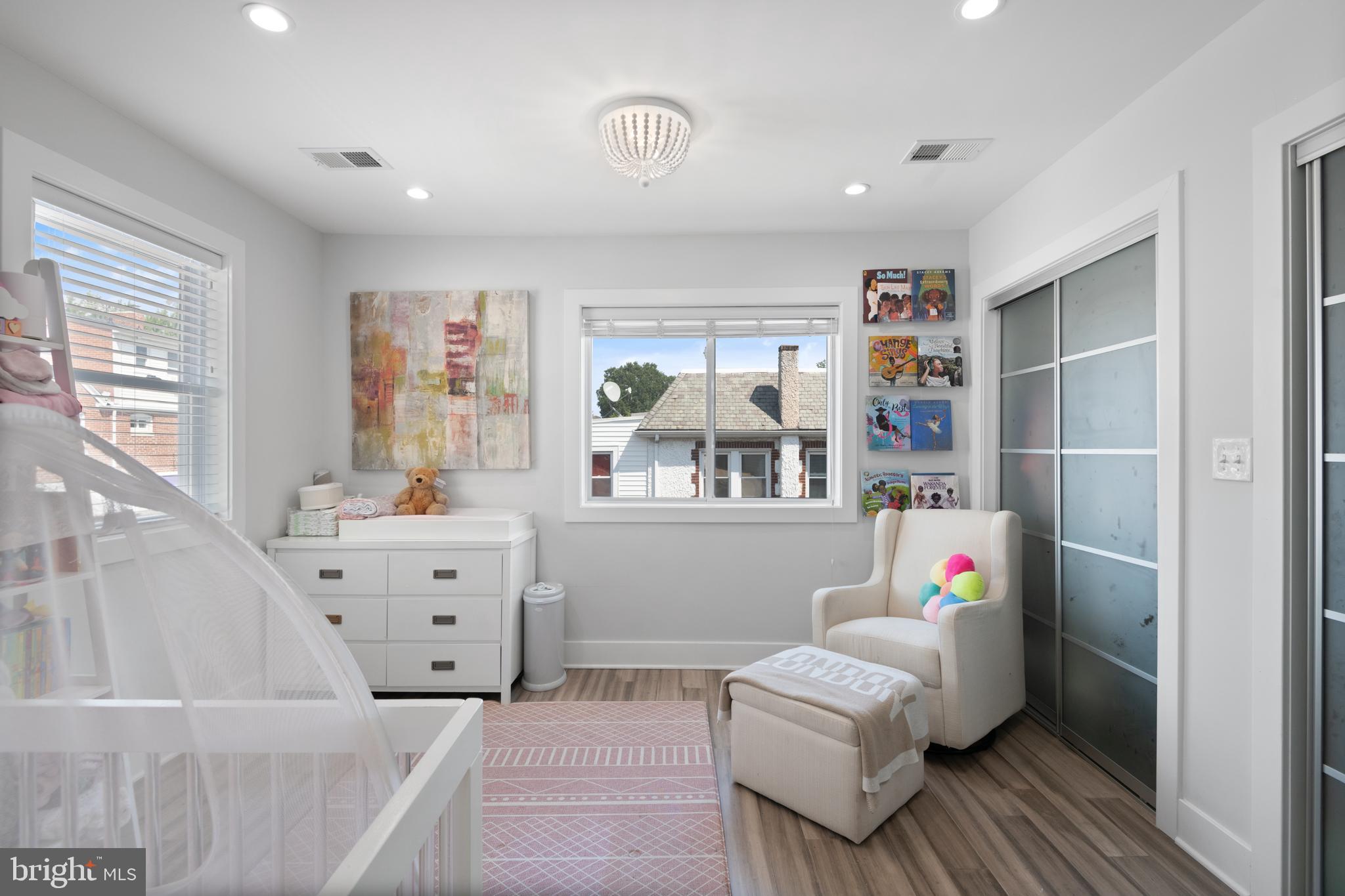 6303 9th Street Northwest Washington, DC 20011 - Photo 25 of 45 a bedroom with furniture and a window