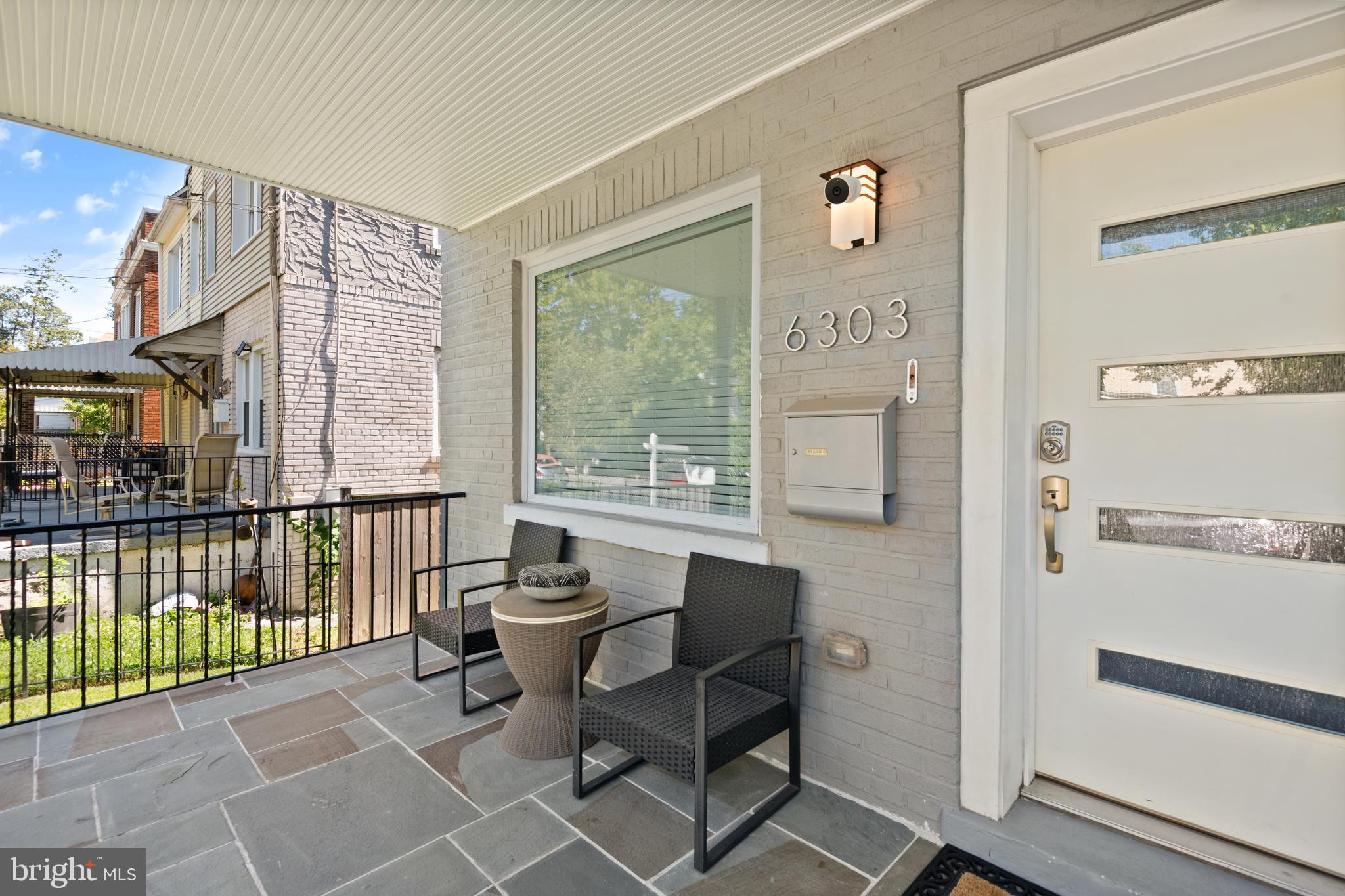6303 9th Street Northwest Washington, DC 20011 - Photo 4 of 45 a view of a balcony with chairs and a table