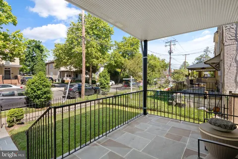 a view of a street from a balcony