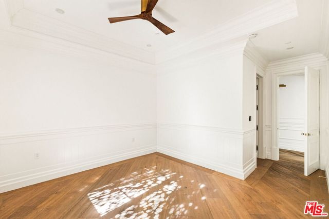 a view of a small space with wooden floor