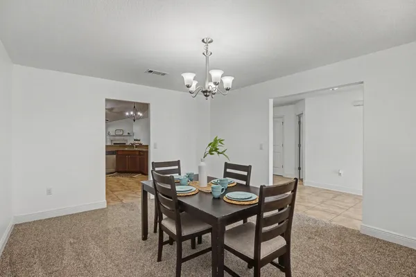 a bedroom with a bed and ceiling fan