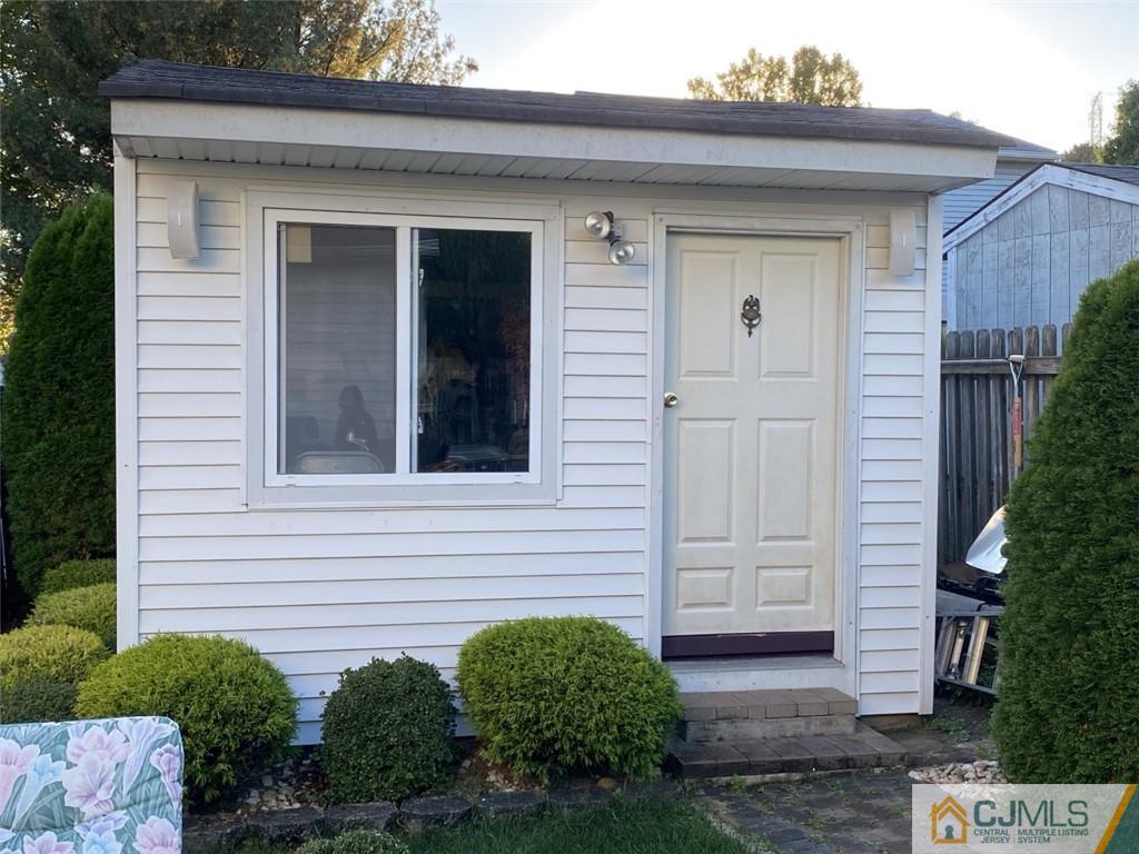 58 Brookside Road Edison, NJ 08817 - Photo 26 of 34 a front view of a house