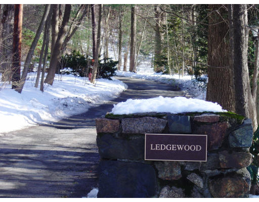 Lot 23 Ledgewood Road Winchester, MA 01890 - Photo 1 of 1 a view of outdoor space with signage and flags