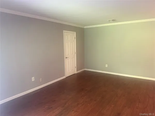 a kitchen with a stove and a refrigerator
