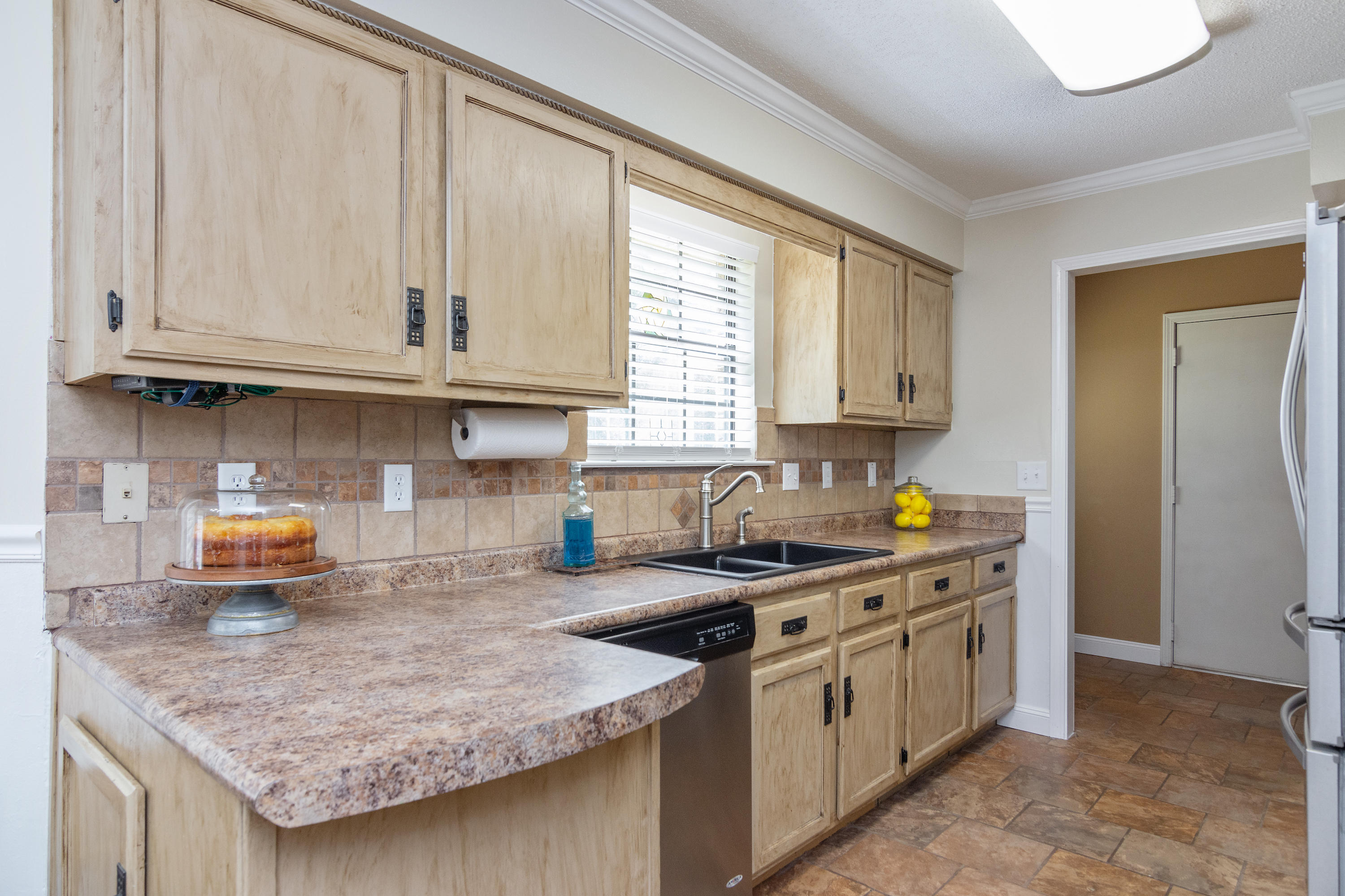 5551 Buckward Road Baker, FL 32531 - Photo 20 of 47 a kitchen with stainless steel appliances granite countertop a sink stove and cabinets