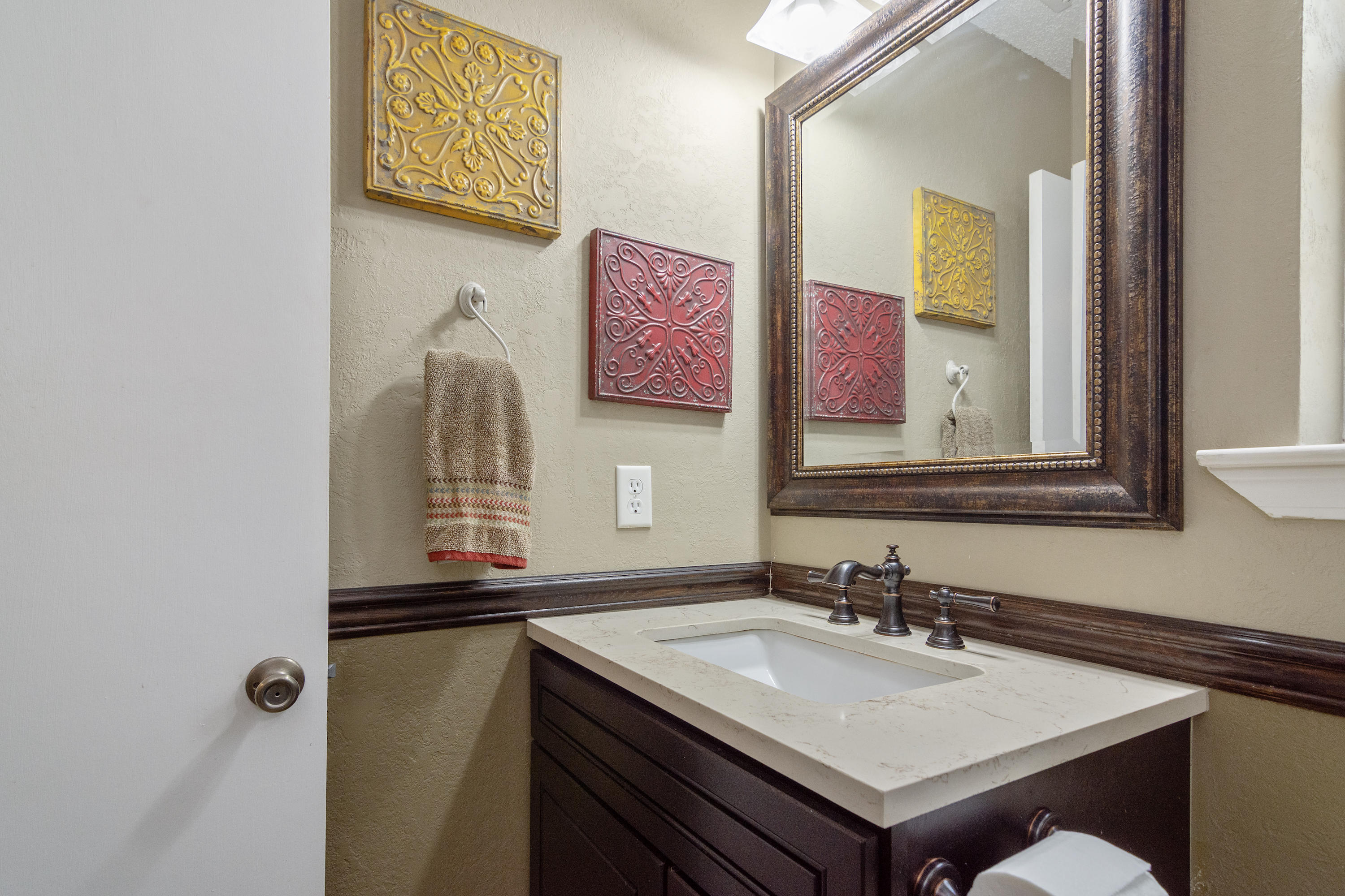 5551 Buckward Road Baker, FL 32531 - Photo 38 of 47 a bathroom with a sink and a mirror
