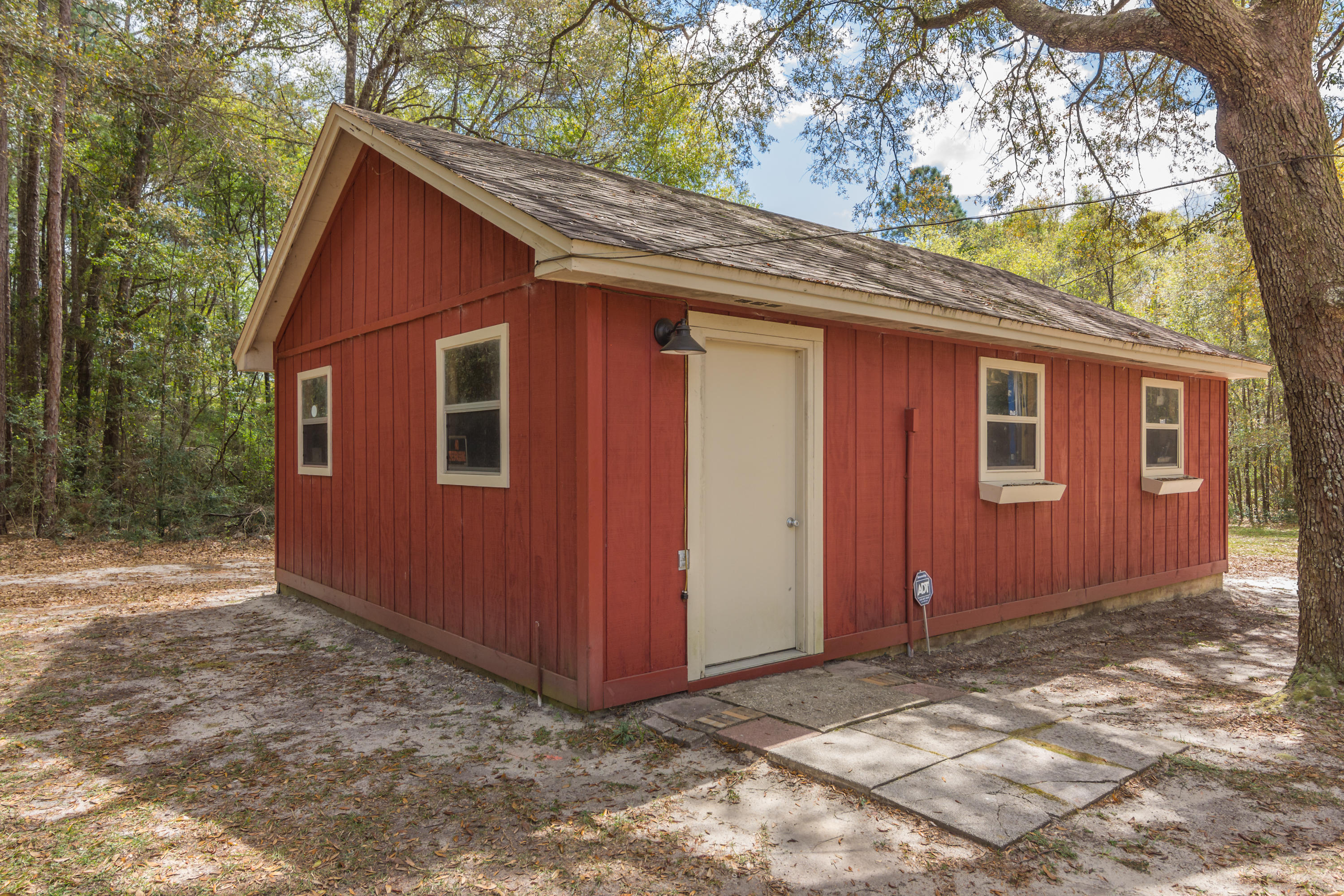5551 Buckward Road Baker, FL 32531 - Photo 5 of 47 a view of a house with a yard