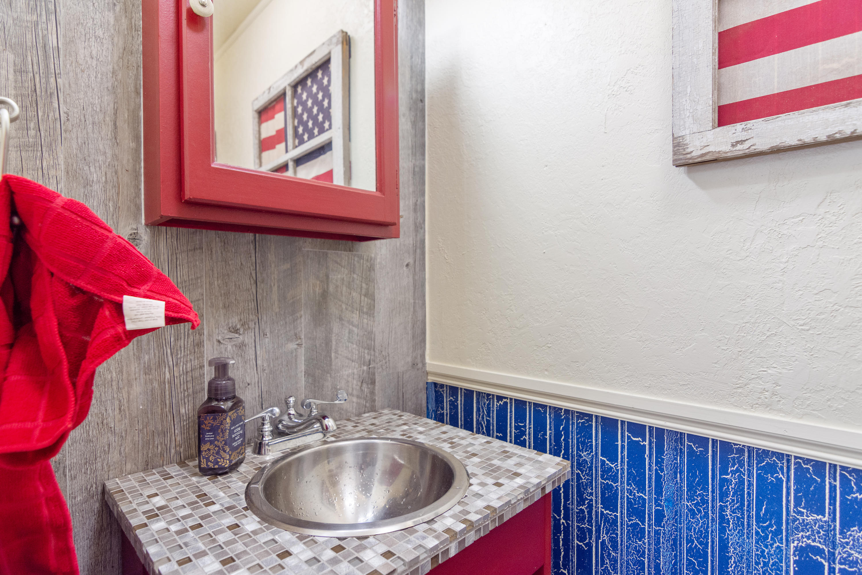 5551 Buckward Road Baker, FL 32531 - Photo 47 of 47 a bathroom with a sink and a mirror