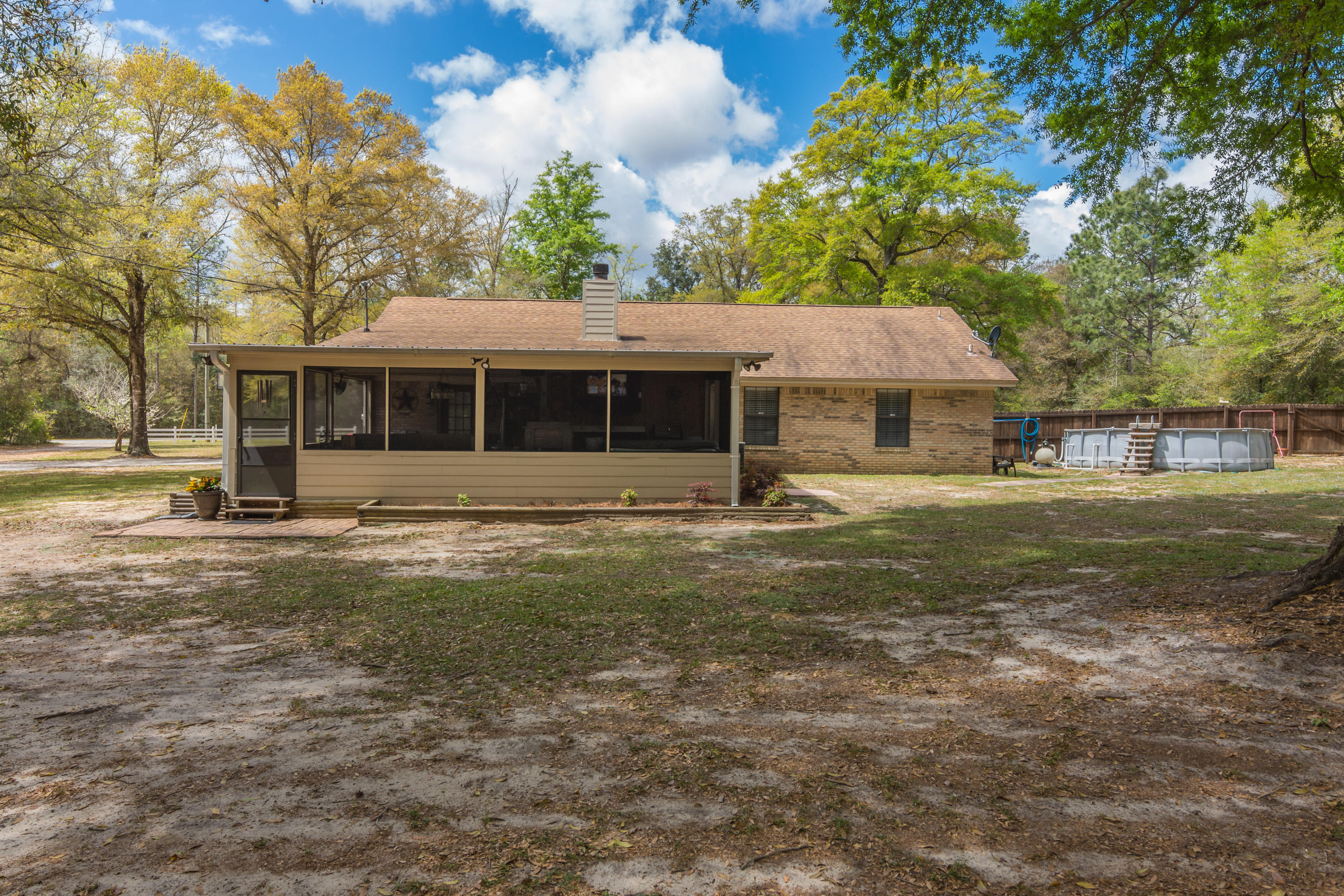 5551 Buckward Road Baker, FL 32531 - Photo 6 of 47 a front view of a house with a yard